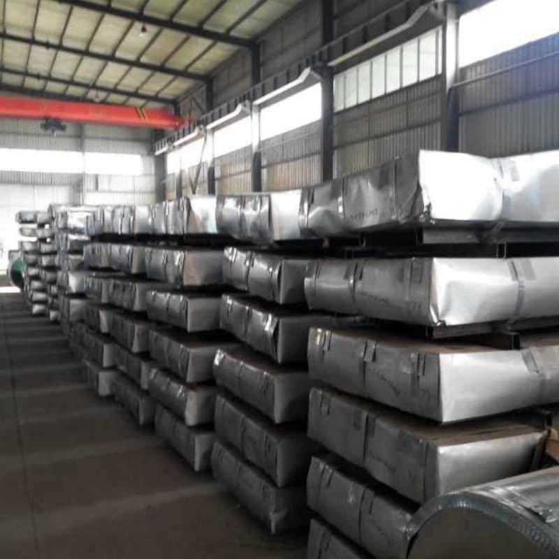 Large inventory of perfectly flat Hot Dipped Galvanized Steel Sheets (GI) stacked in Ruicheng Steel warehouse