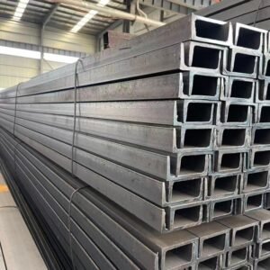 Close-up view of Hot Rolled Steel U Channel profiles stacked in the warehouse, showing the structural U-beam shape