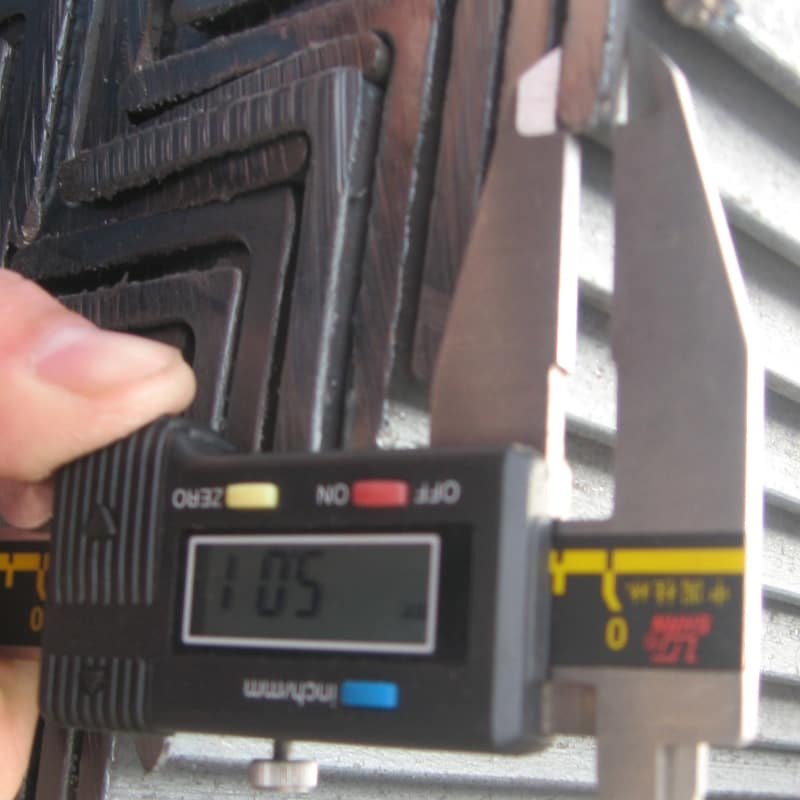 Surface detail of SS400 Q235 Angle Steel with standard black finish